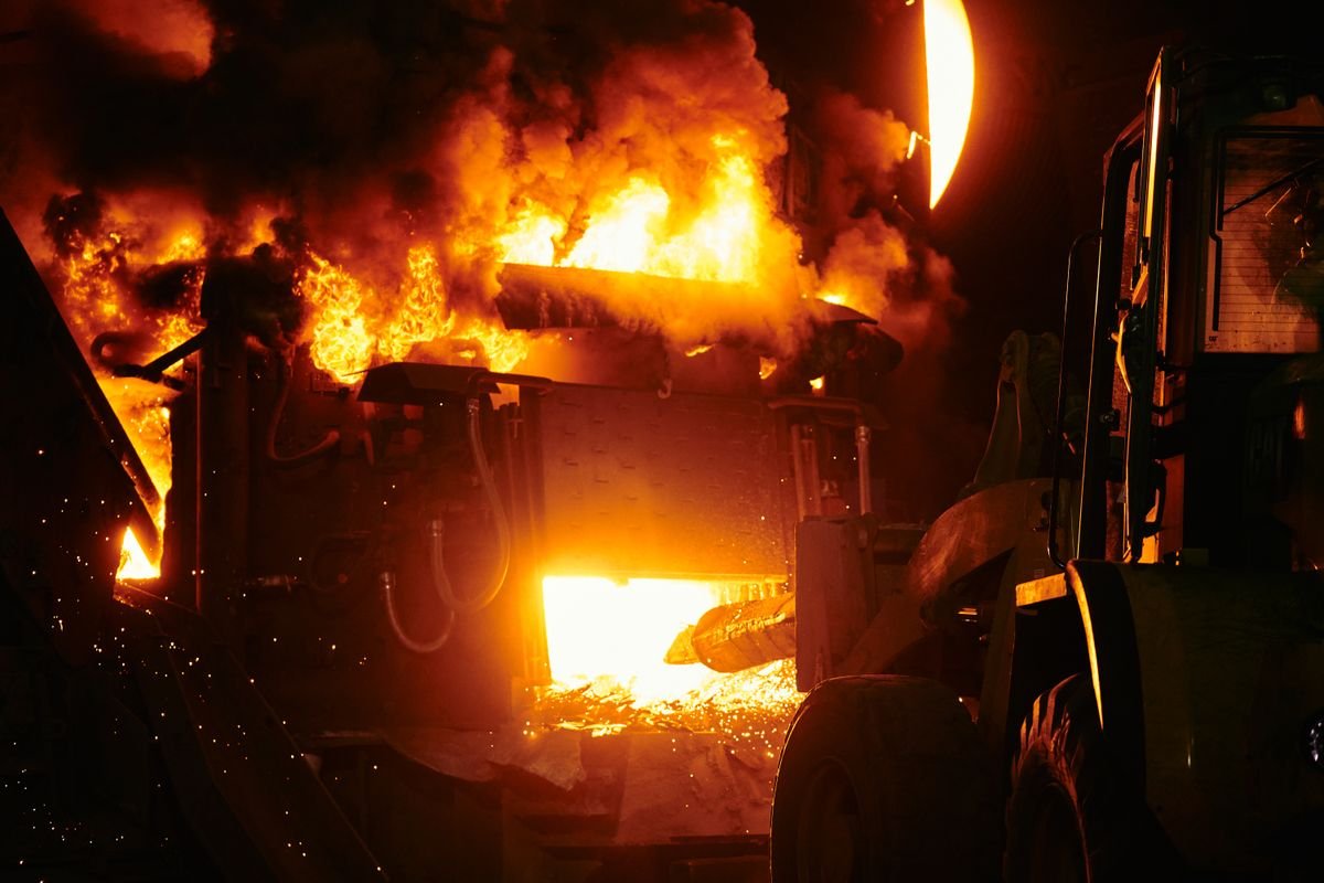 Foundry furnace glowing at night